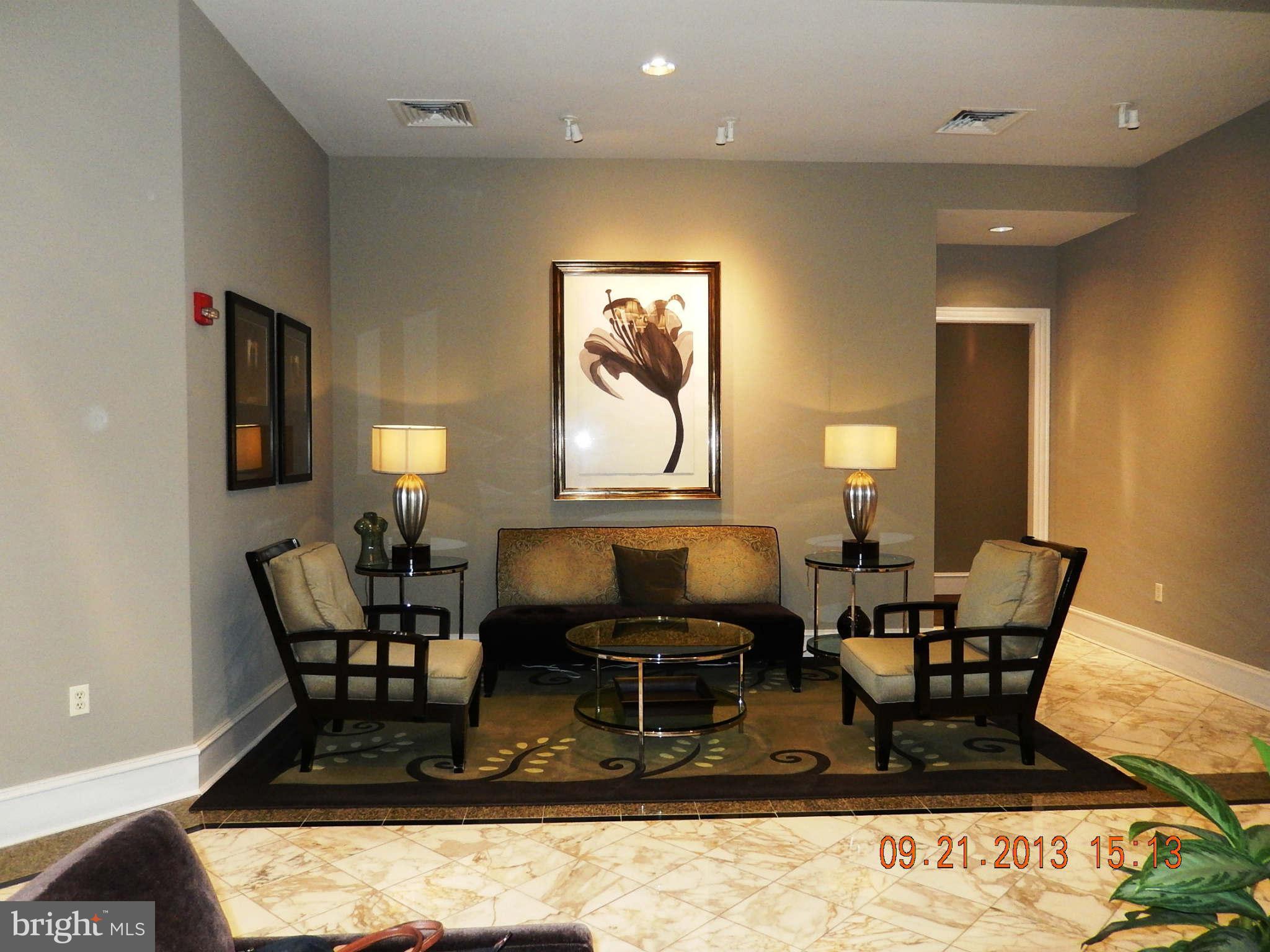 851 North Glebe Road, Unit 1018 Arlington, VA 22203 - Photo 24 of 24 a living room with furniture and window