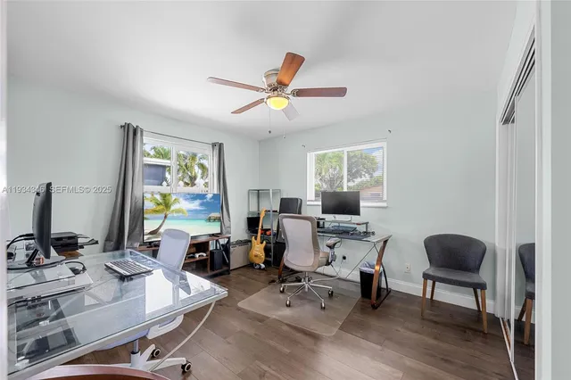a swimming pool with outdoor seating and yard