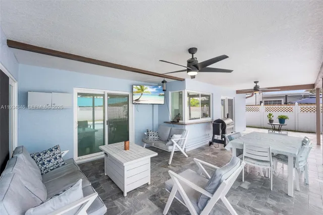 a view of a livingroom with furniture and front door