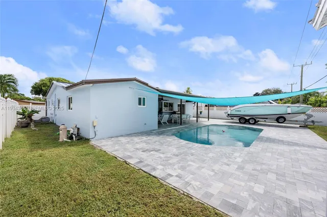 an aerial view of a house with garden