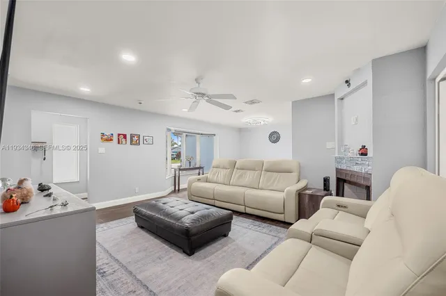 a kitchen that has a sink and a stove in it