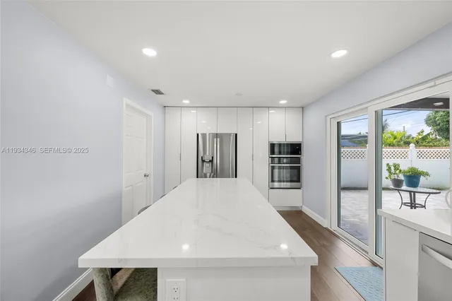 a room with furniture and a wooden floor