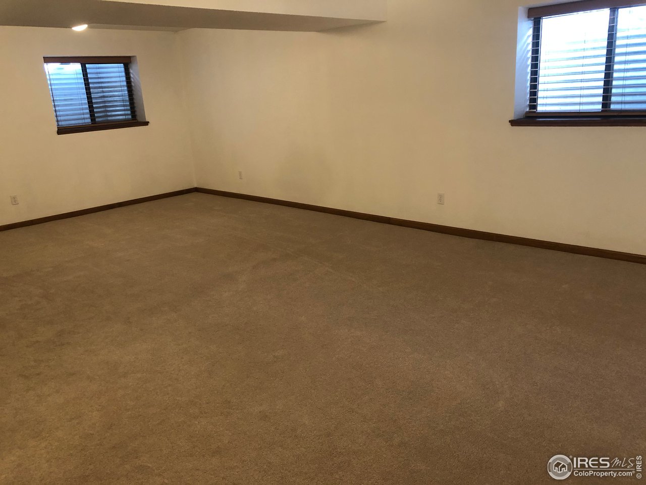 4702 9th St Road Greeley, CO 80634 - Photo 13 of 18 Huge Rec Room in Basement!