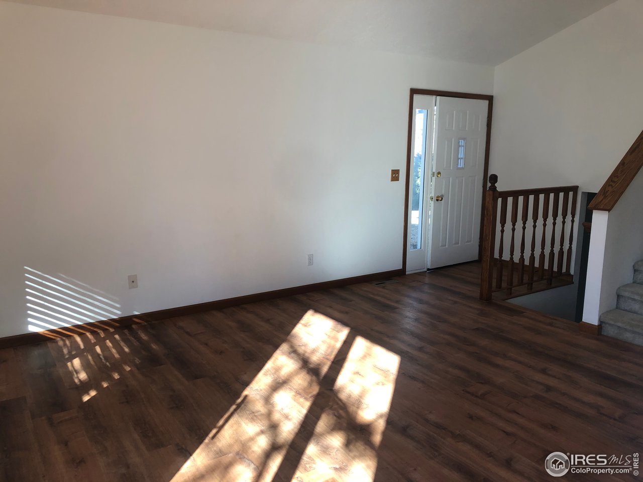4702 9th St Road Greeley, CO 80634 - Photo 3 of 18 Main Floor Entry & Living Room