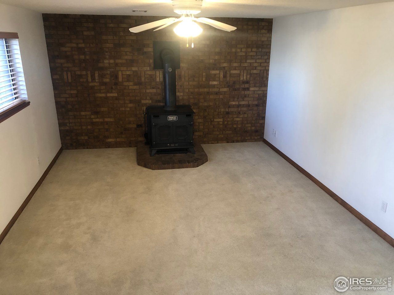 4702 9th St Road Greeley, CO 80634 - Photo 9 of 18 Cozy Family Room