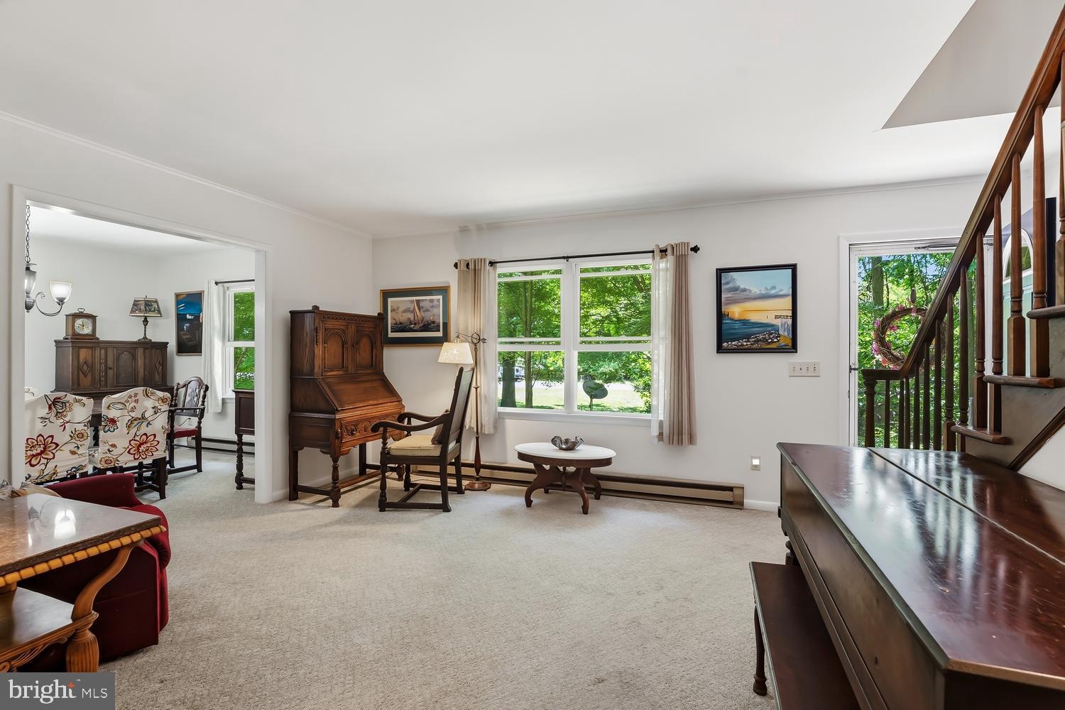 814 Wrights Neck Road Centreville, MD 21617 - Photo 27 of 53 a view of a livingroom with workspace and a couch