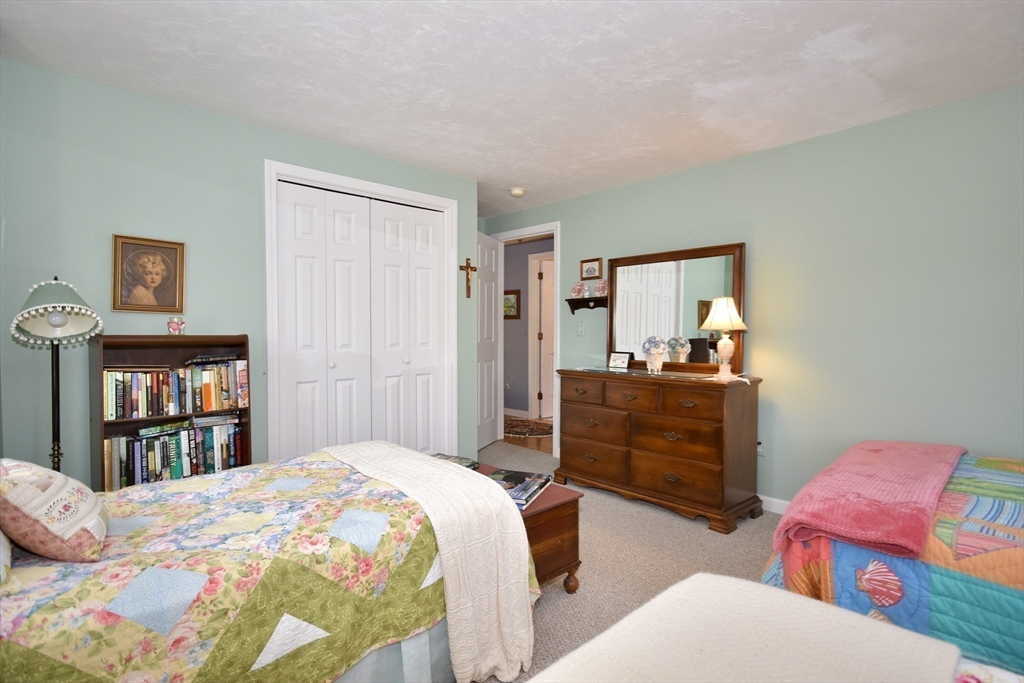 6 Oakbluff Road Bourne, MA 02562 - Photo 29 of 36 a bedroom with a bed and a closet