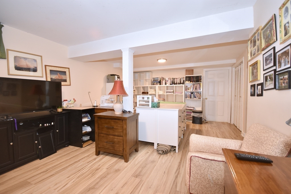 6 Oakbluff Road Bourne, MA 02562 - Photo 34 of 36 a bedroom with a bed and furniture