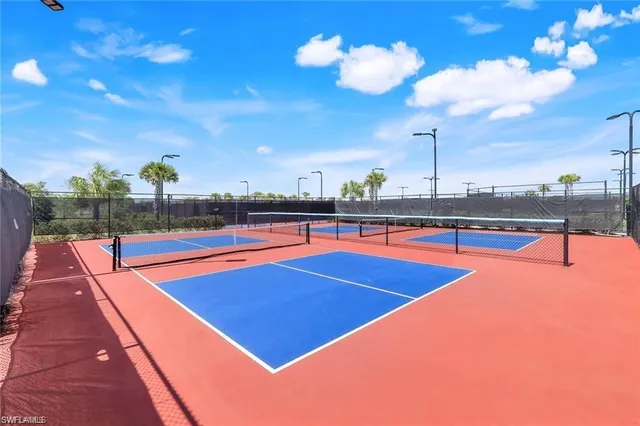 a view of swimming pool with seating area