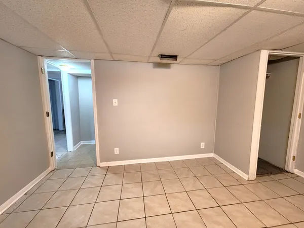 a view of an empty room and window