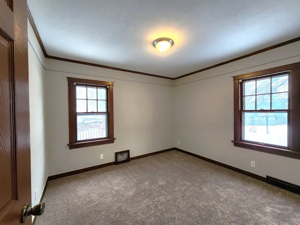 an empty room with windows