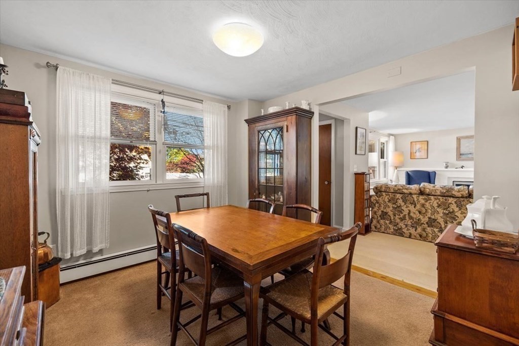 7 Irving Road Natick, MA 01760 - Photo 16 of 39 a view of a dining room with furniture and a window