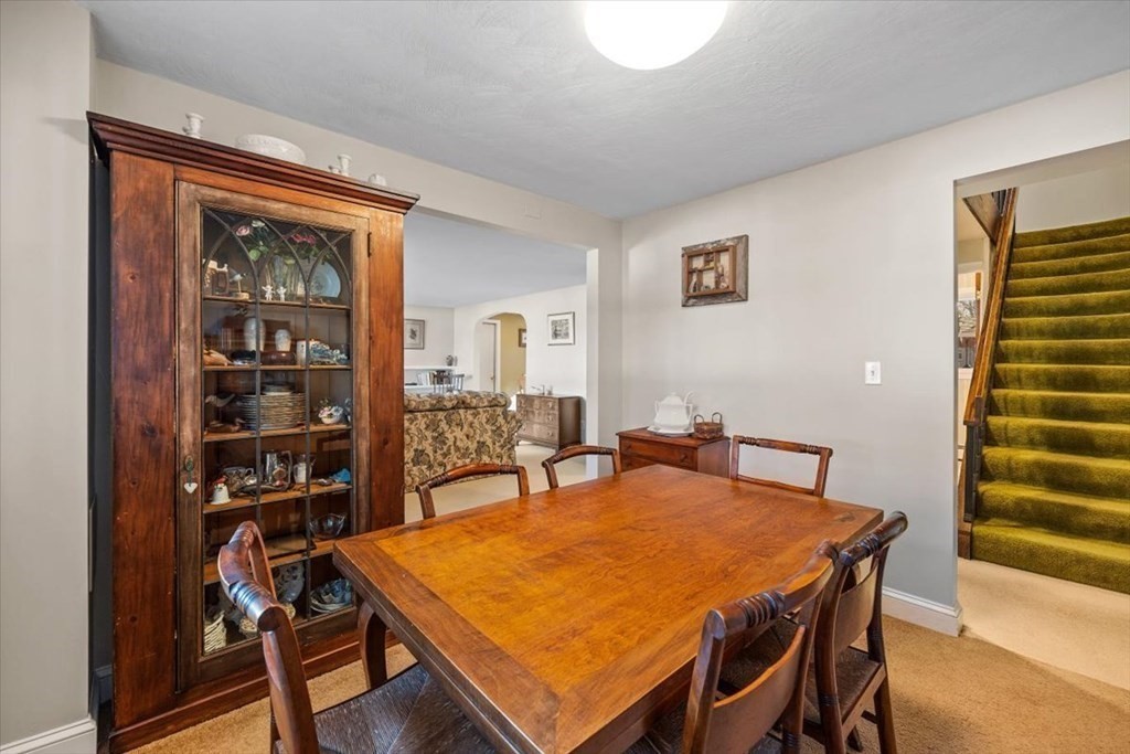 7 Irving Road Natick, MA 01760 - Photo 18 of 39 a dining room with a table and chairs