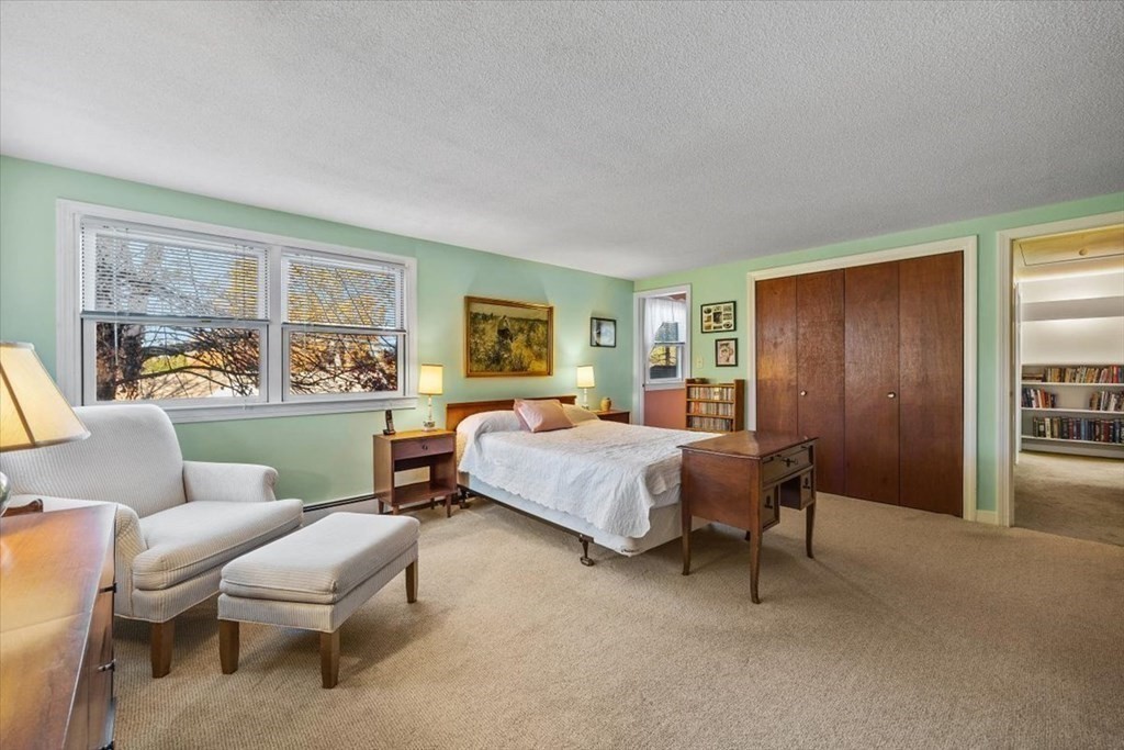 7 Irving Road Natick, MA 01760 - Photo 26 of 39 a bedroom with a bed and wooden floor