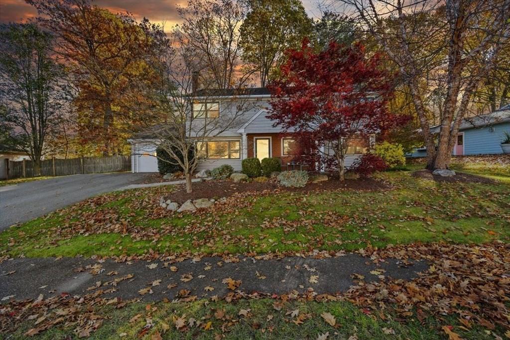 7 Irving Road Natick, MA 01760 - Photo 3 of 39 a front view of a house with a yard