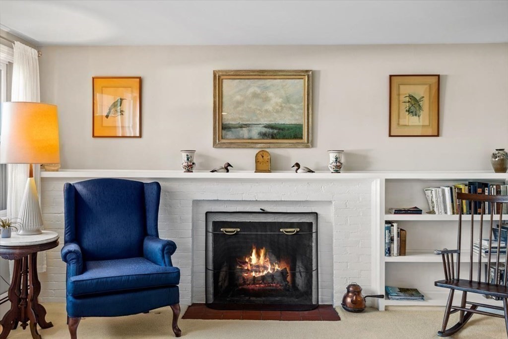 7 Irving Road Natick, MA 01760 - Photo 4 of 39 a living room with furniture and a fireplace