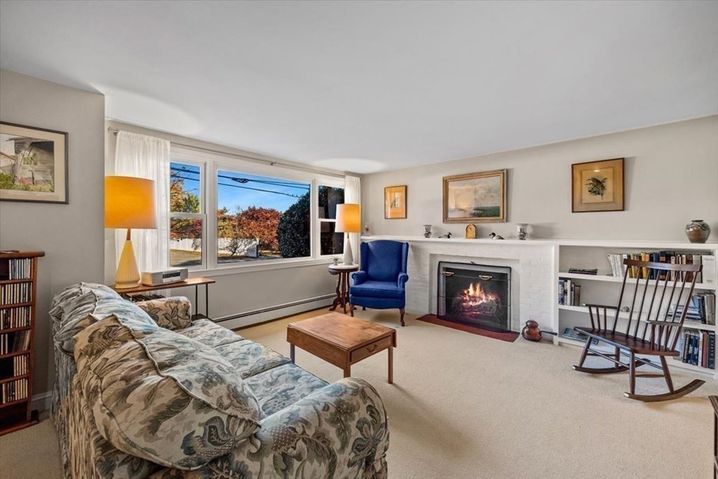 7 Irving Road Natick, MA 01760 - Photo 6 of 39 a living room with furniture and a fireplace