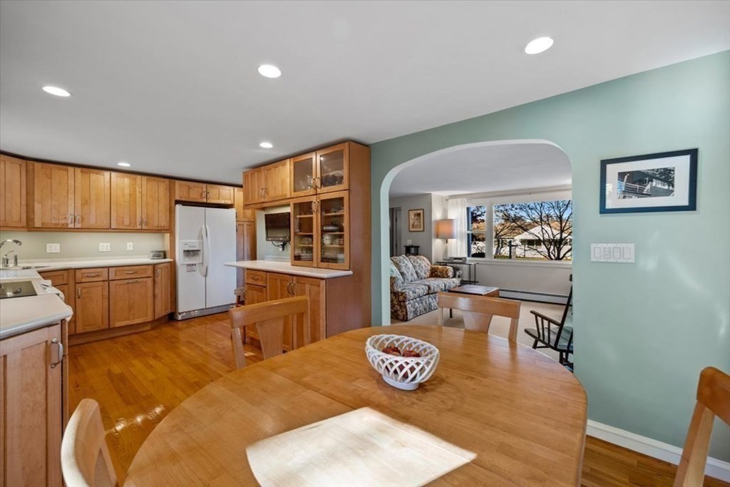 7 Irving Road Natick, MA 01760 - Photo 9 of 39 a open kitchen with cabinets table and chairs
