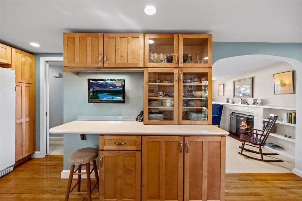 7 Irving Road Natick, MA 01760 - Photo 10 of 39 a view of kitchen with furniture and wooden floor