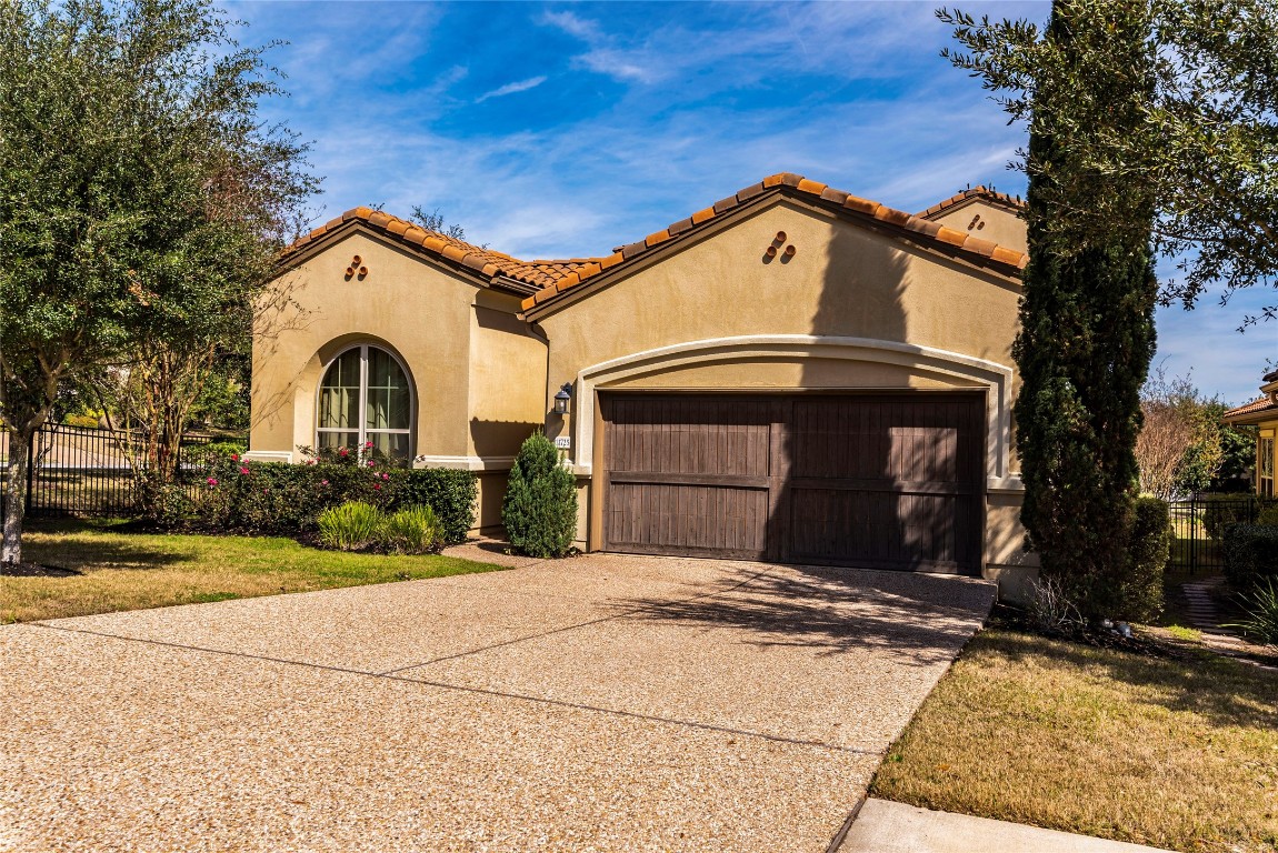 11725 Shadestone Terrace Austin, TX 78732 - Photo 1 of 1 a view of a house with a yard