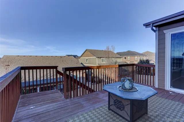 a view of a balcony dining area