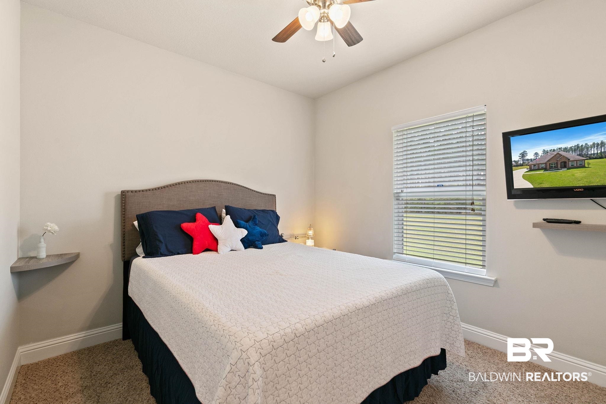 12750 B Jenkins Pit Road Daphne, AL 36527 - Photo 44 of 89 Bedroom with a ceiling fan and carpet