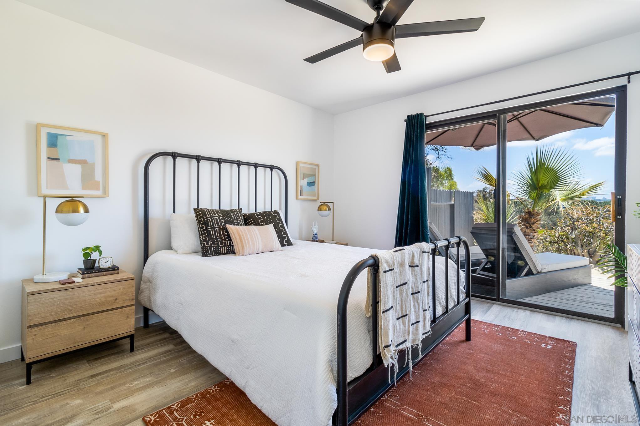 3854 Via Del Mar San Diego, CA 92130 - Photo 28 of 61 a bed room with a bed and a couch