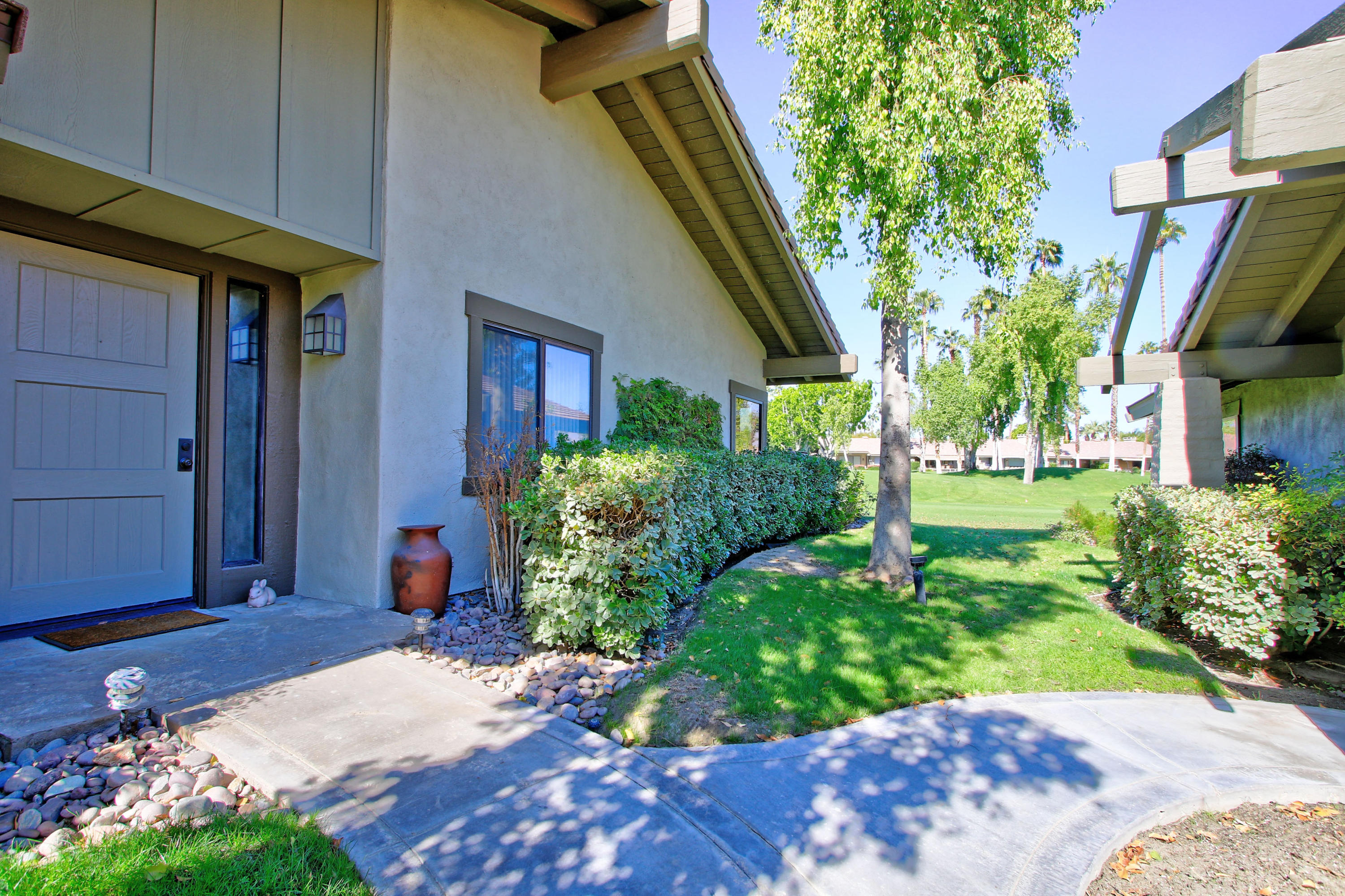 368 Red River Road Palm Desert, CA 92211 - Photo 5 of 36 a view of a porch with a yard