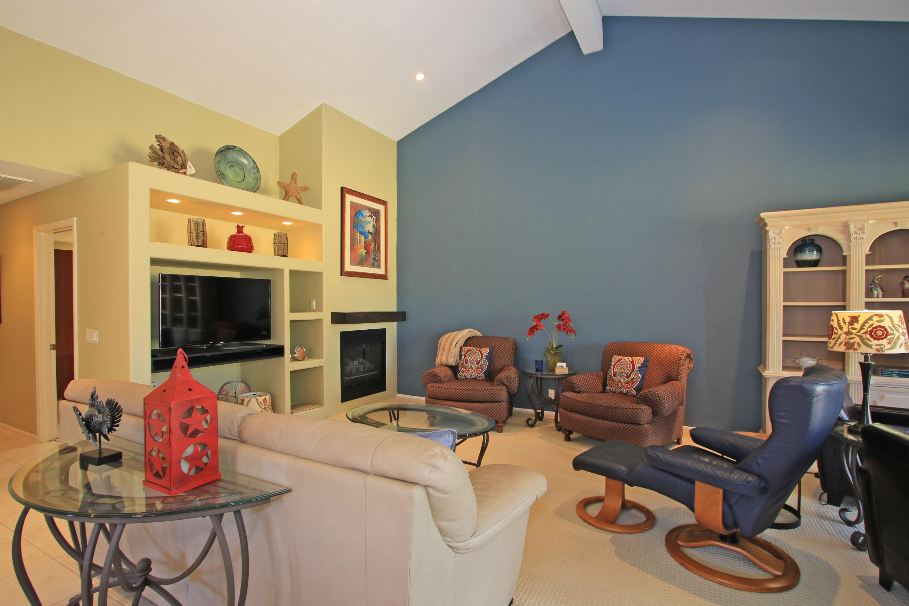 368 Red River Road Palm Desert, CA 92211 - Photo 9 of 36 a bedroom with furniture and a flat screen tv