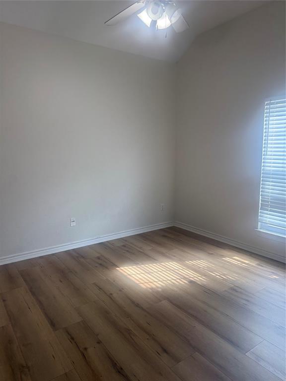 303 Quail Run Road Red Oak, TX 75154 - Photo 11 of 19 a view of an empty room and window