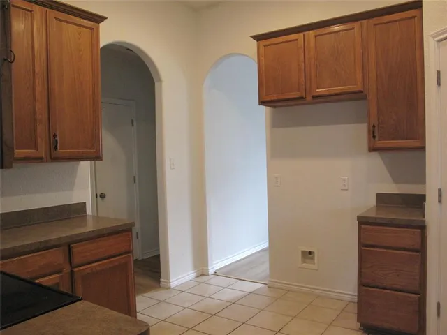 a view of room with cabinets