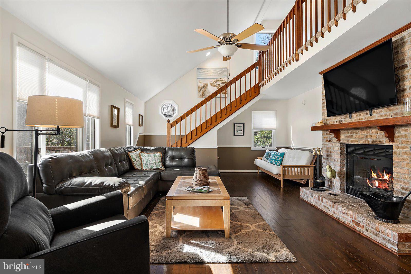 47 Drawbridge Road Ocean Pines, MD 21811 - Photo 11 of 75 a living room with furniture fireplace and a flat screen tv