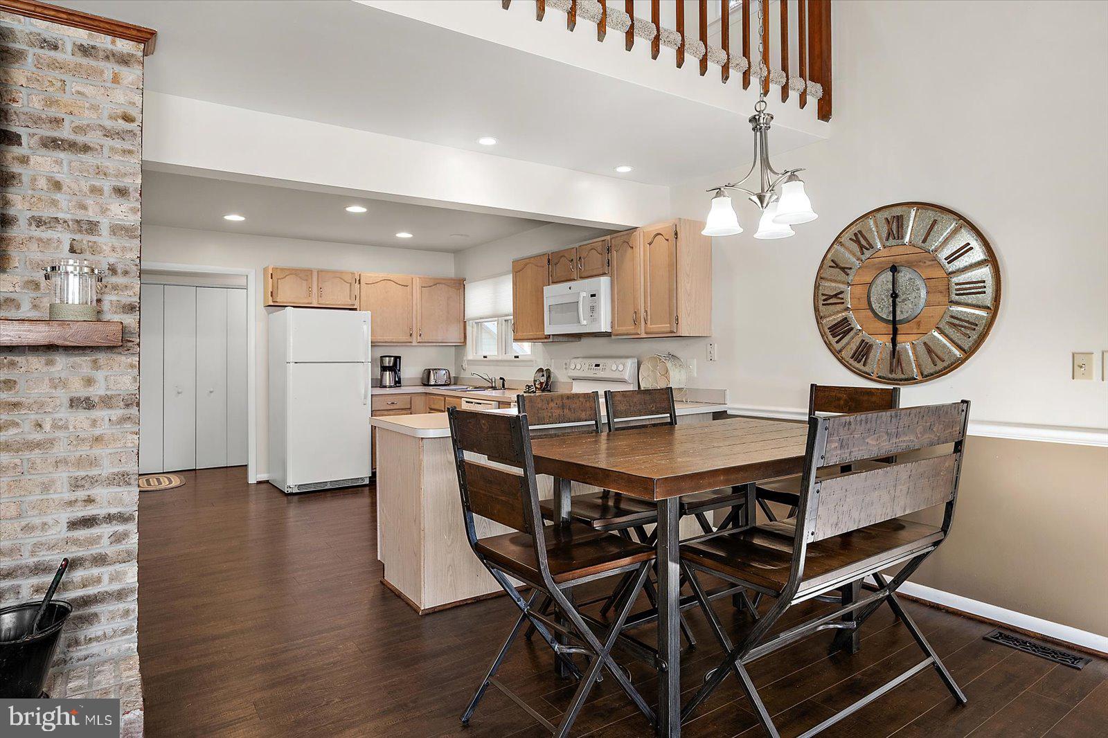 47 Drawbridge Road Ocean Pines, MD 21811 - Photo 18 of 75 a view of a dining room with furniture and a kitchen