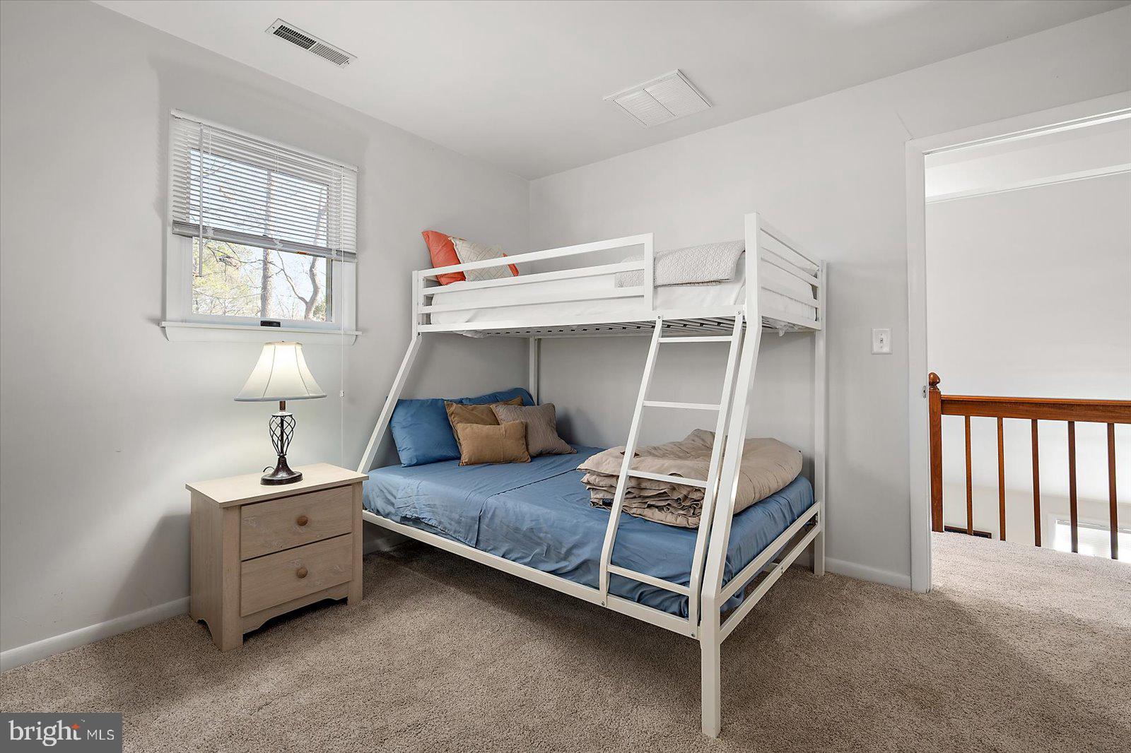 47 Drawbridge Road Ocean Pines, MD 21811 - Photo 35 of 75 a bedroom with a bed and a window