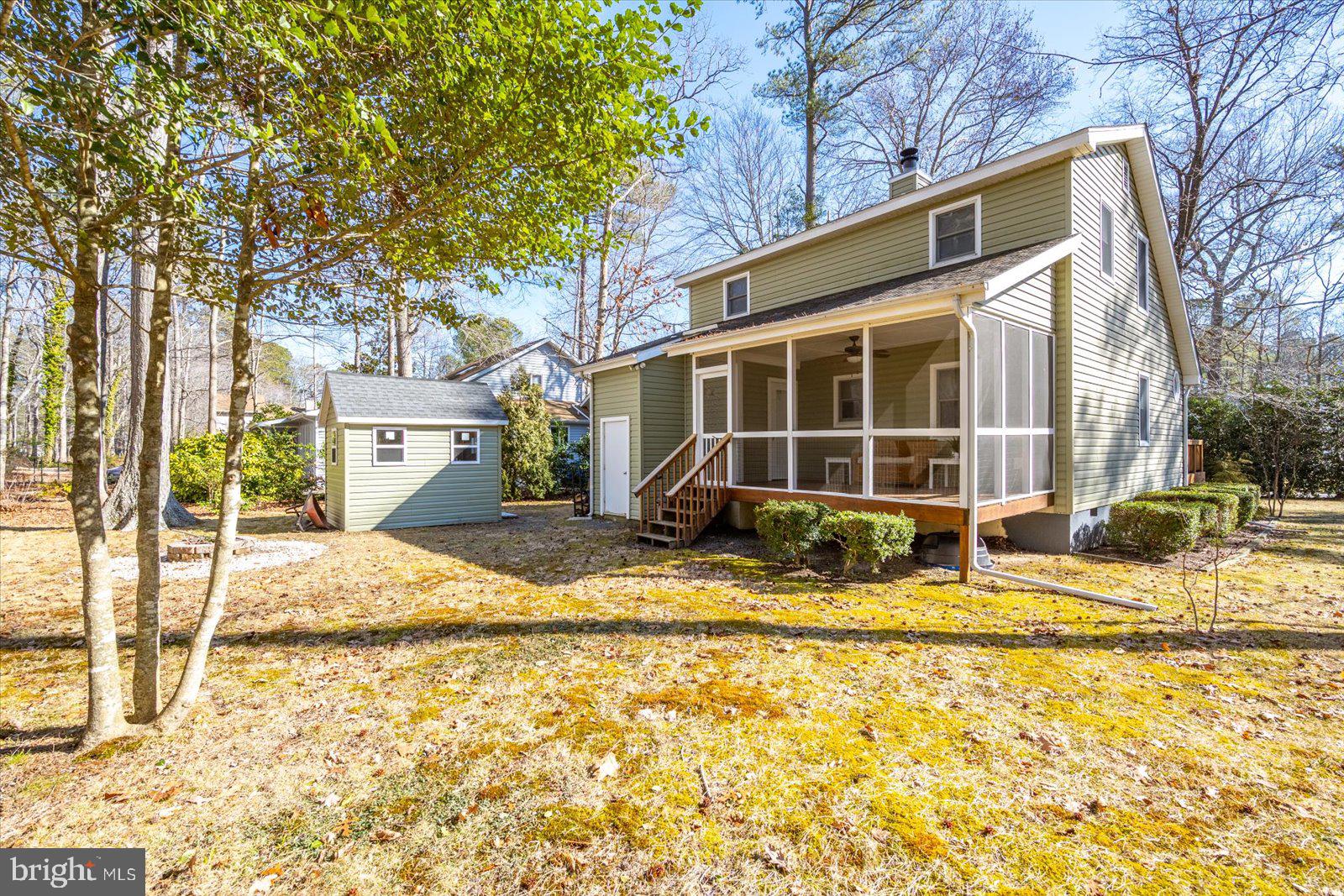 47 Drawbridge Road Ocean Pines, MD 21811 - Photo 47 of 75 a view of a house with snow on the background