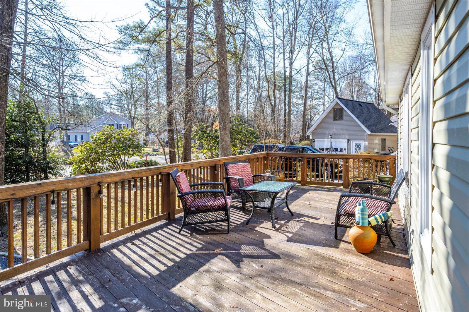 47 Drawbridge Road Ocean Pines, MD 21811 - Photo 6 of 75 a view of sitting area with furniture on wooden deck