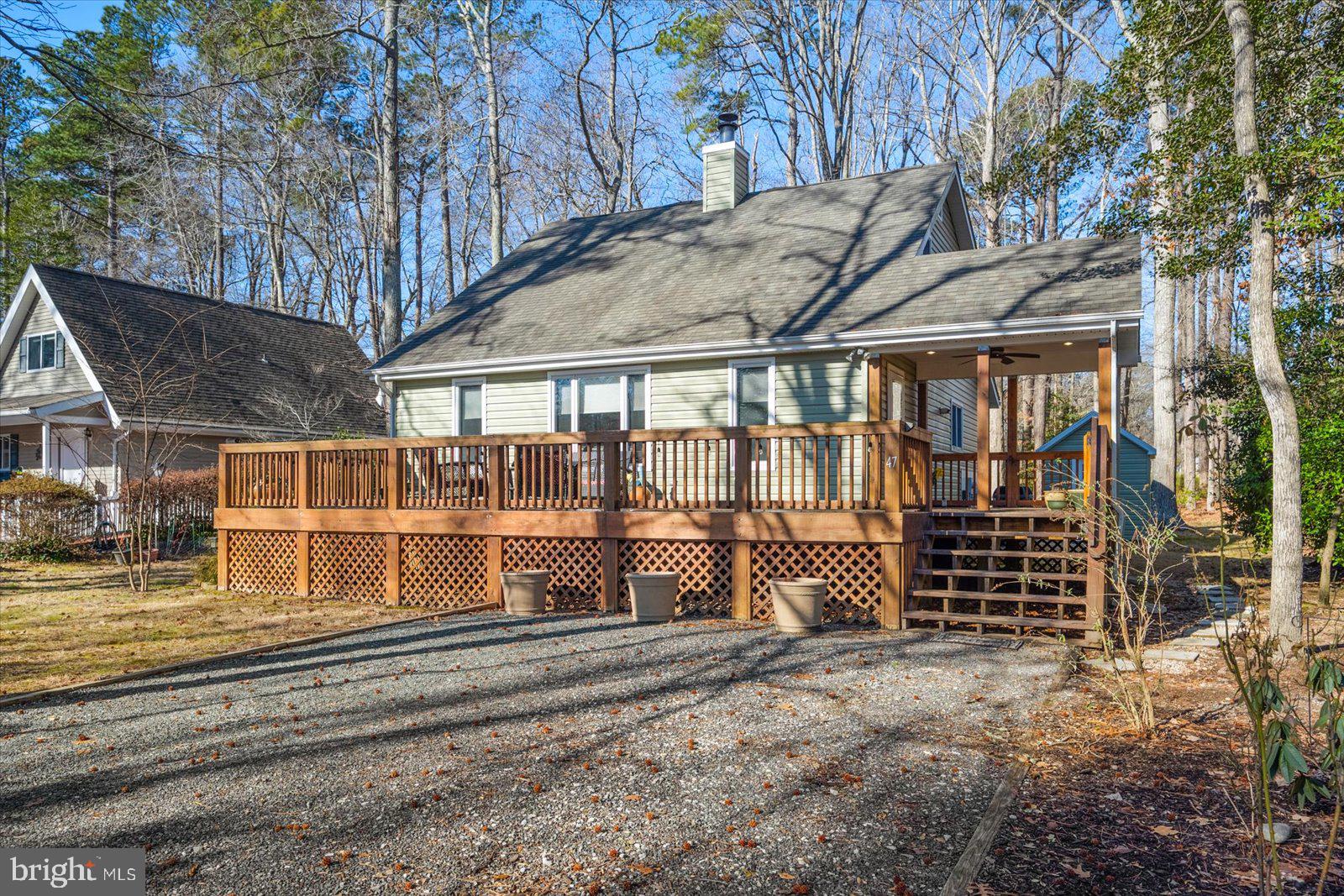 47 Drawbridge Road Ocean Pines, MD 21811 - Photo 61 of 75 a view of a house with a backyard