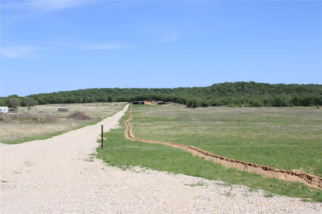 1650 County Road 119 Gordon, TX 76453 - Photo 15 of 15 a view of a lake from a yard