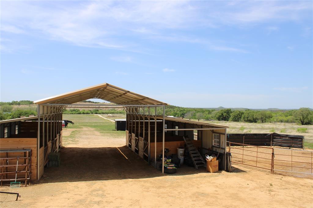 1650 County Road 119 Gordon, TX 76453 - Photo 6 of 15 a view of a terrace with a garden