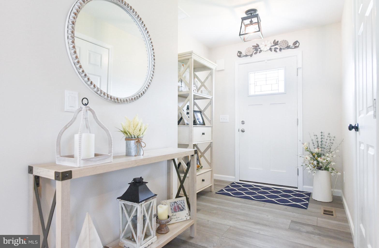 33510 Deer Run Road Frankford, DE 19945 - Photo 2 of 53 a view of entryway with wooden floor