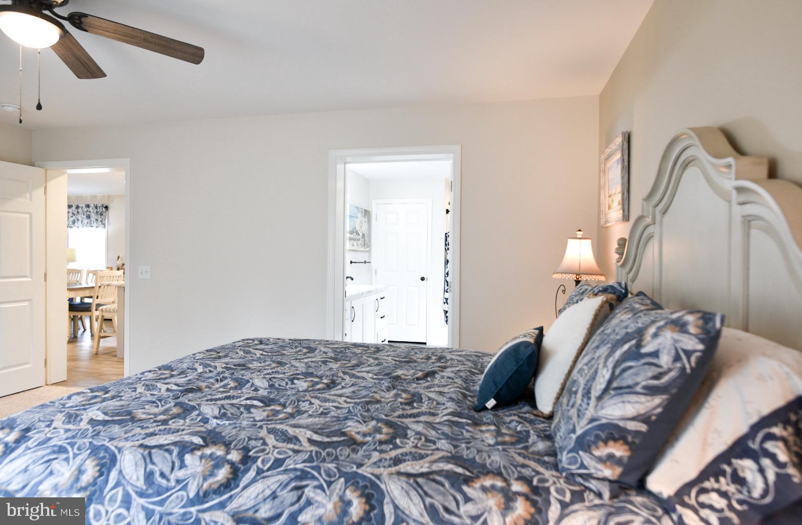 33510 Deer Run Road Frankford, DE 19945 - Photo 39 of 53 a bedroom with a bed and a window