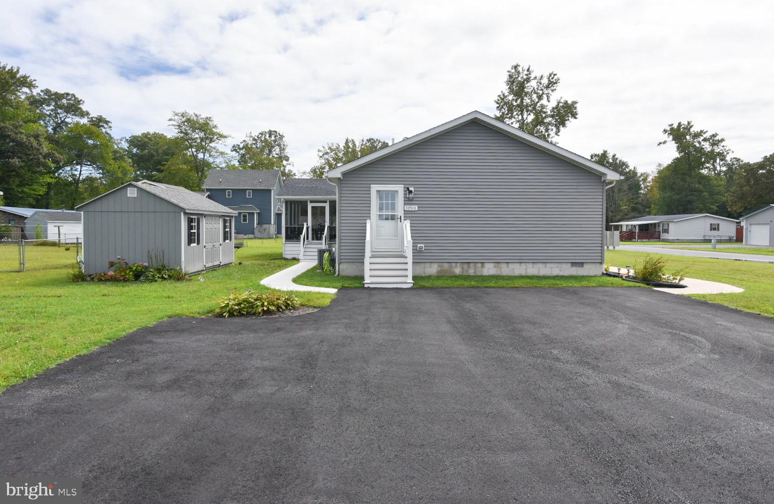 33510 Deer Run Road Frankford, DE 19945 - Photo 47 of 53 a view of a house with backyard and yard