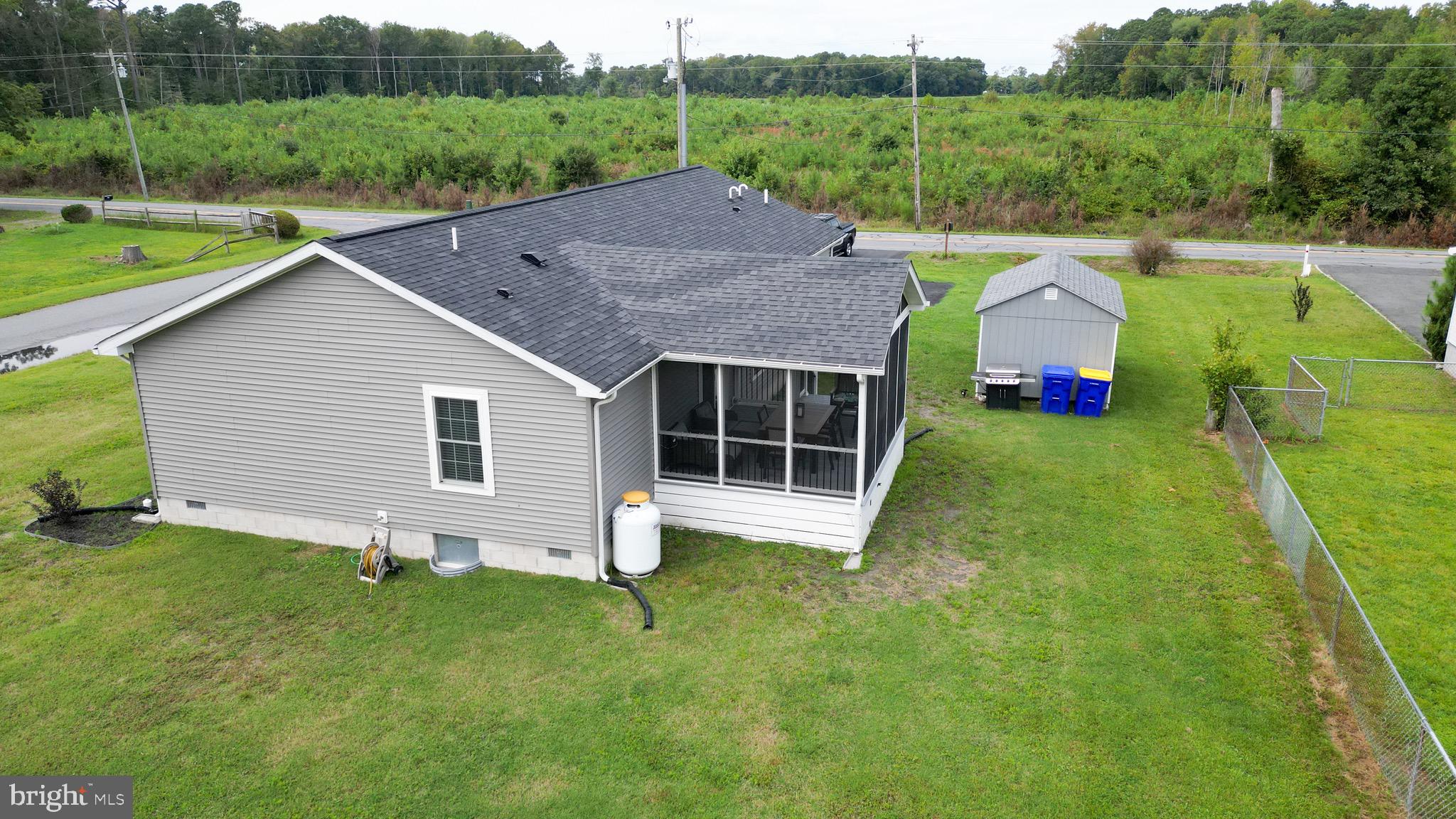 33510 Deer Run Road Frankford, DE 19945 - Photo 51 of 53 a aerial view of a house with pool and a yard