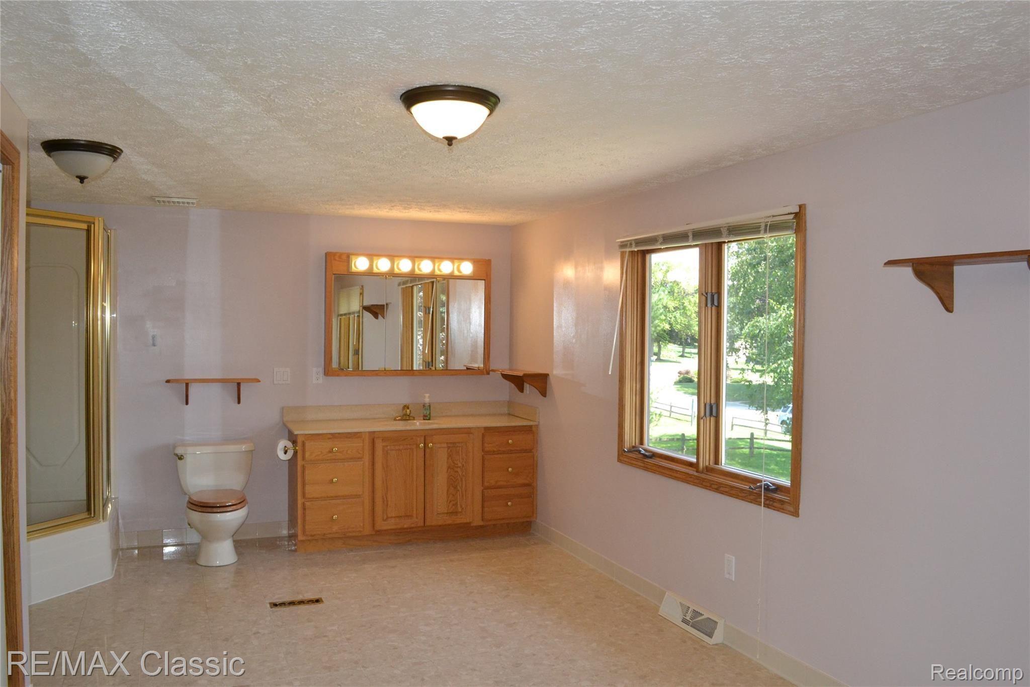 4443 Ravinewood Drive Commerce Township, MI 48382 - Photo 37 of 46 Master Bath
