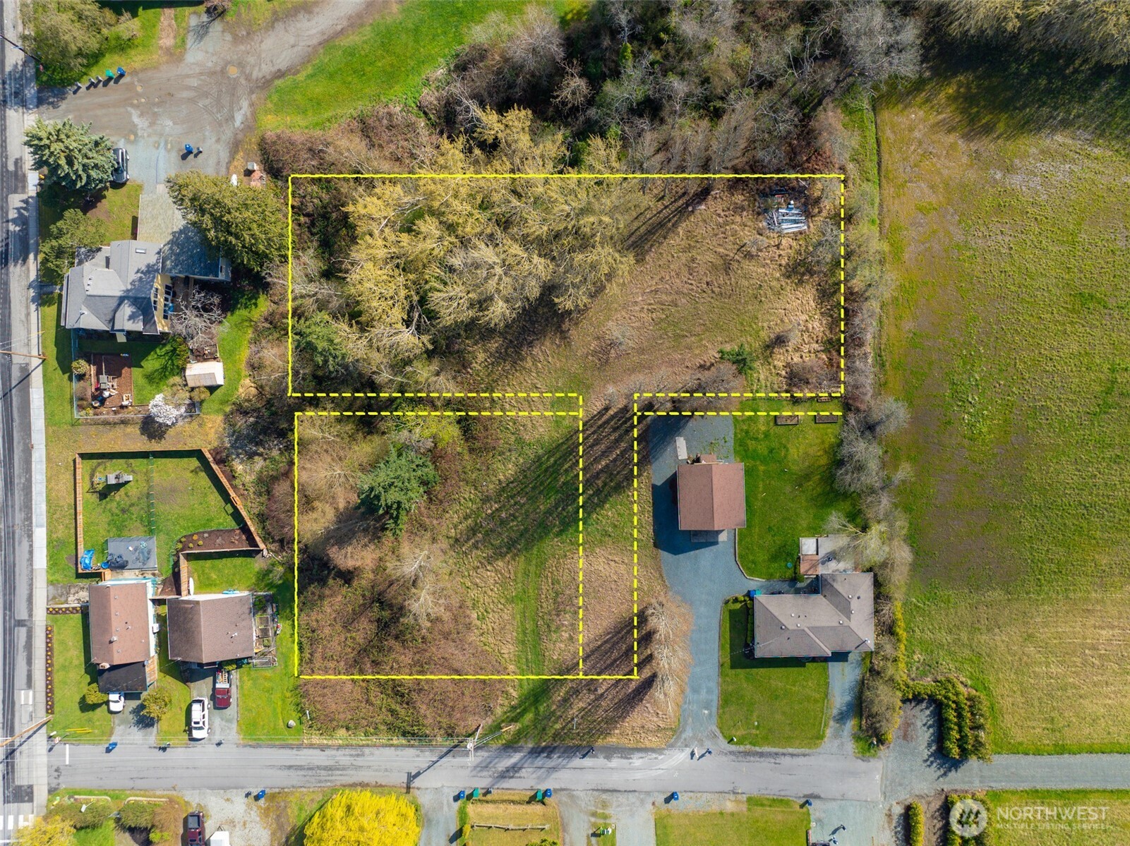 4011 Commercial Avenue Anacortes, WA 98221 - Photo 2 of 10 an aerial view of residential houses with outdoor space