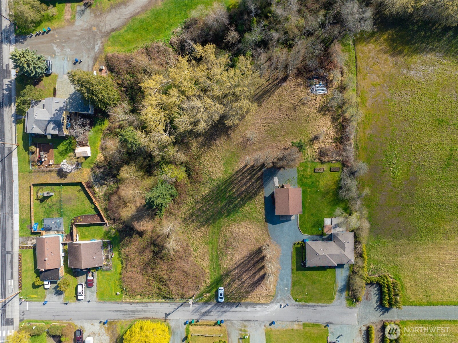 4011 Commercial Avenue Anacortes, WA 98221 - Photo 3 of 10 an aerial view of residential houses with outdoor space