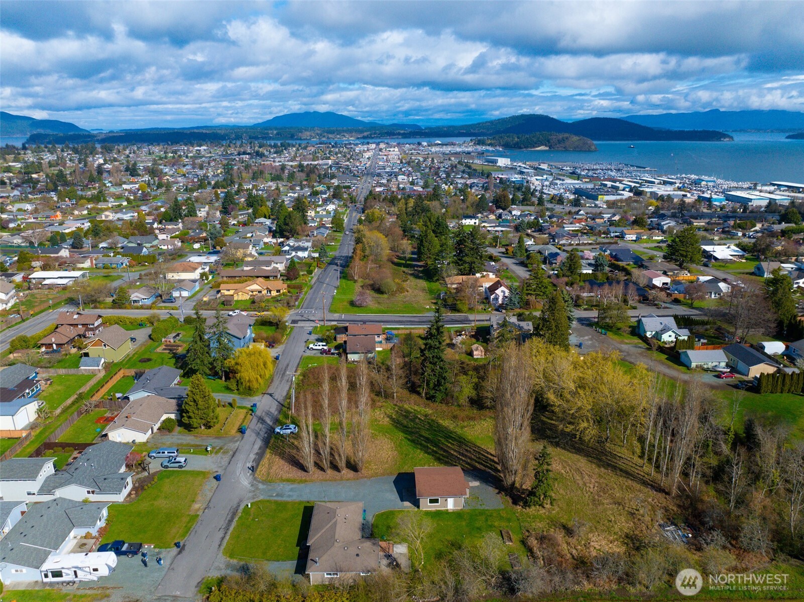 4011 Commercial Avenue Anacortes, WA 98221 - Photo 5 of 10 an aerial view of residential building and car parked