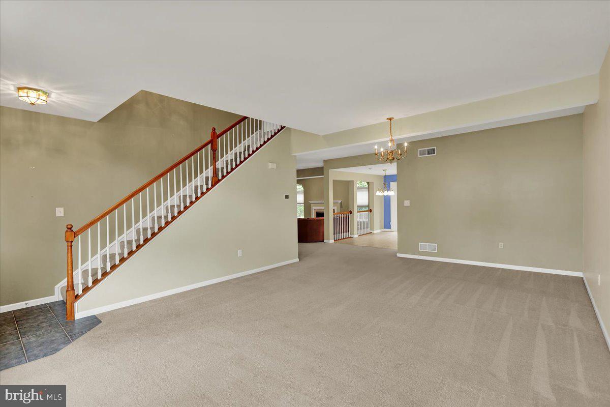 203 Barrington Drive Reading, PA 19607 - Photo 4 of 44 a view of an empty room with stairs