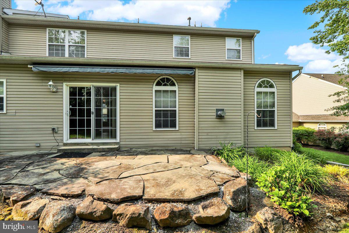 203 Barrington Drive Reading, PA 19607 - Photo 42 of 44 a front view of a house with a yard