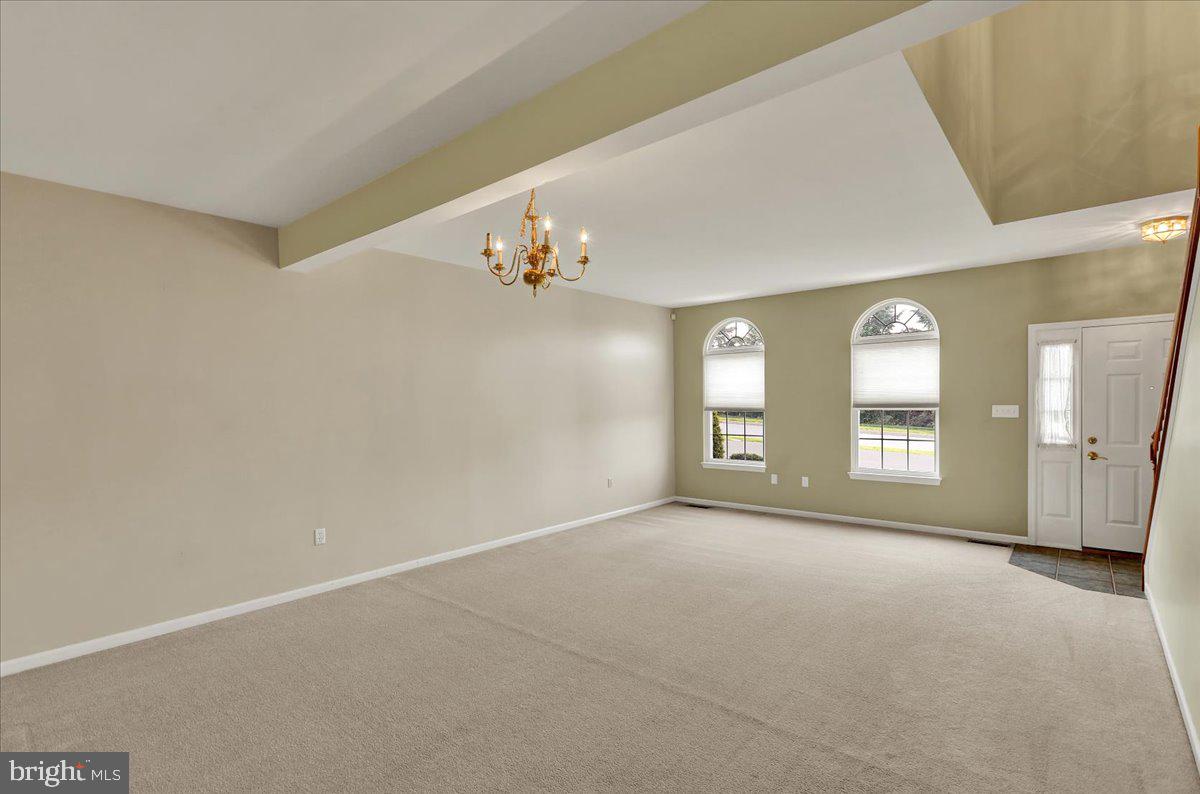 203 Barrington Drive Reading, PA 19607 - Photo 6 of 44 a view of an empty room with a window